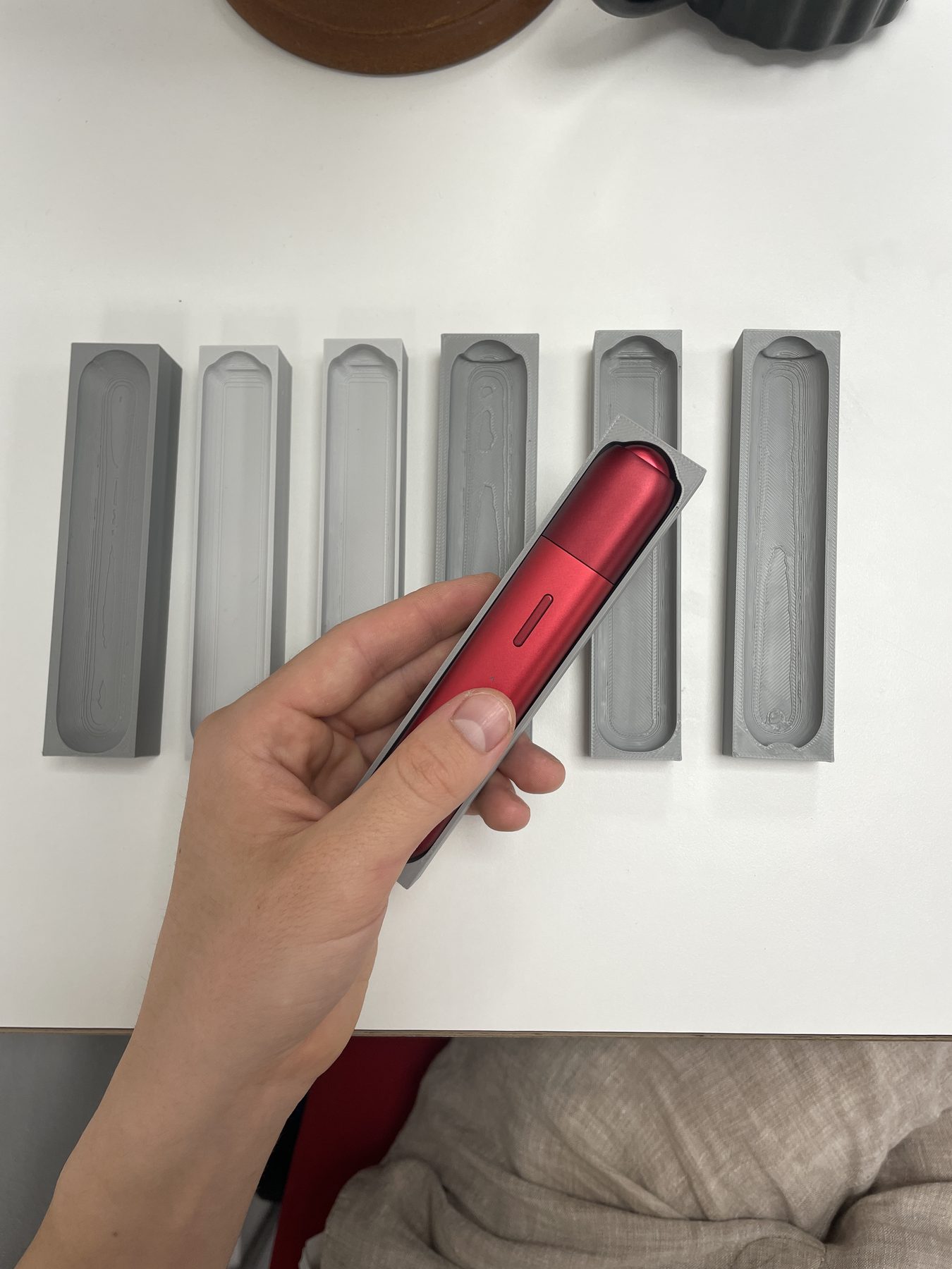 3D-printed inner holders being test-fitted
