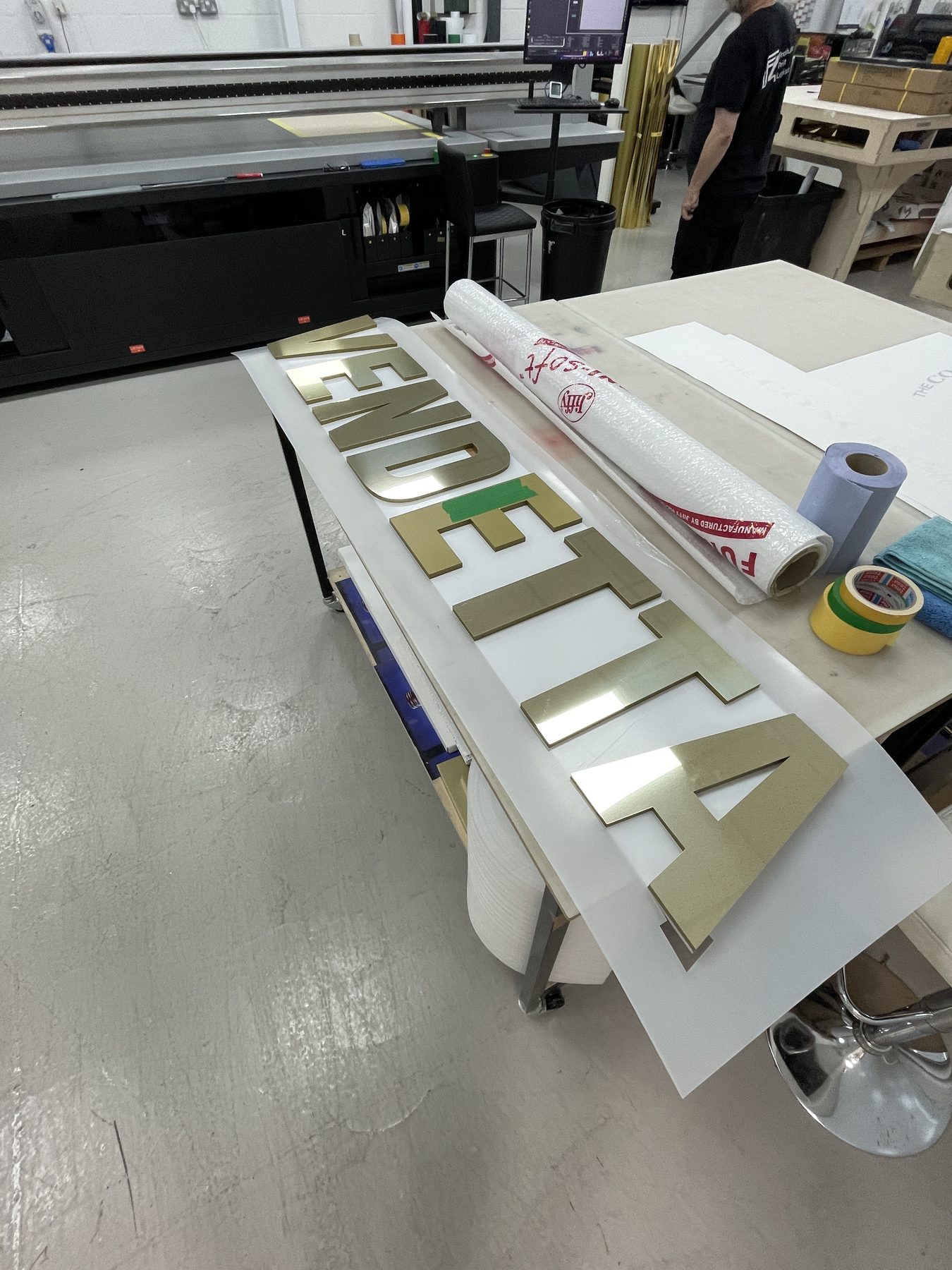 Lettering coming off the UV printer